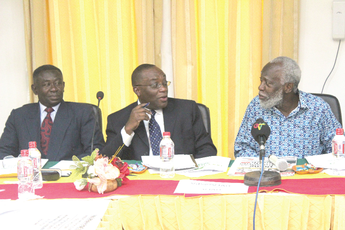 The Chief Executive of DVLA, Mr Kwasi Agyeman Busia (left) in a chat with Prof. Stephen Addei, a former Rector of GIMPA, who moderated the event